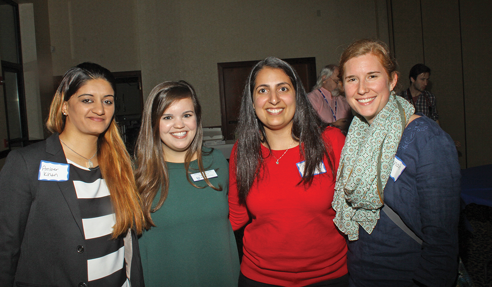 Muslim and Jewish students Amber Khan, Megan Sappenfield, Corie Hampton, and Hannah Henza enjoy the evening together.  Photo courtesy of Ivan Cutler