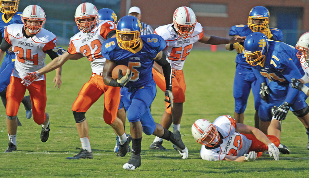 Senior running back Connell Young rushed for 176 on 17 carries and scored three touchdowns in Dudley’s’ 56-14 beat down of Davie County. Photo by Joe Daniels/Carolina Peacemaker